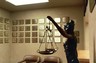 Scales of Justice in foreground.  In background, some of the TRIALS1 Awards commemorating the hundreds of cases wherein Mr. Sullivan obtained not guilty verdicts and dismissals in the 28 years in that he's practived criminal law in Palm Springs