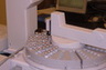 Immunoassay auto sampler.  This device is a quick & inexpensive device used to test for drugs in a forensic sample.  The device will generate a printed ribbon tape (like a grocery store receipt) showing what illegal drugs are presumptively present.