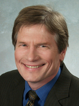 Charles E Szurszewski