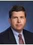 Mark L Donahue