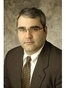 Thomas E. Carlotto