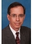 Garden City Business Lawyer James M. Dennis
